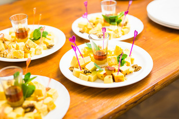 Cubes of yellow cheese