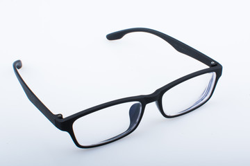 black frame spectacles isolated on white background close up