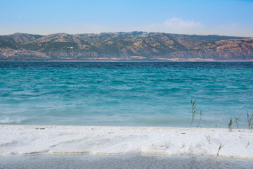 White sandy beach and sky in Lake Salda Turkey