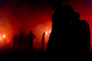 Silhouettes Of Protesters