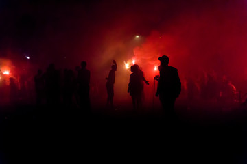 Silhouettes Of Protesters