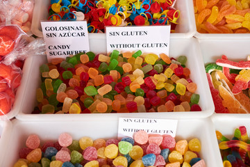 Large choice of sweets candies, jujube on the Sunday market in Spain, Mercadillo de Campo de Guardamar.