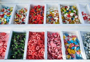 Large choice of sweets candies, jujube on the Sunday market in Spain, Mercadillo de Campo de...