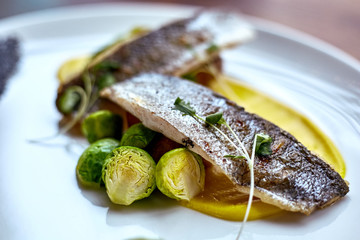 fried herring. Marinated fried herring fillets. Fried herrings, chips and vegetables