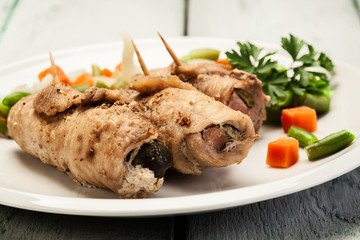 Pork rolls and vegetables