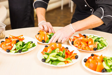 Close-up of chef cooking food kitchen restaurant cutting cook hands hotel man male knife preparation fresh preparing concept