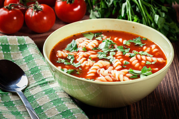 Tomato soup noodles in the bowl