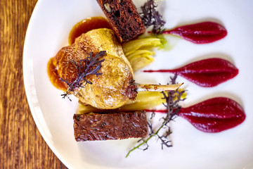 Duck Legs with Mashed Potato. Goose Legs with Cabbage, Croquette and orange Sauce.  duck with potatoes.