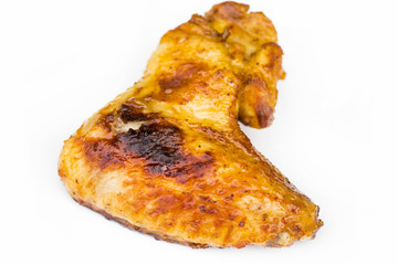 Grilled chicken wings, tray shot with selective focus