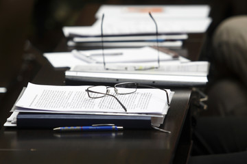 Business papers and documents in conference room