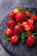 Fresh ripe strawberry and cherry