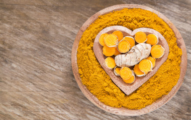 Roots and turmeric powder (Curcuma longa)