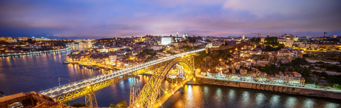 Porto, Portugal: the Dom Luis I Bridge and the old town at sunset
