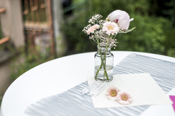 flowers settings decoration outdoor setup for wedding with pink colored flower