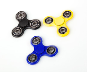 Three Fidget Spinner on white background