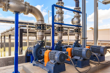 Wastewater treatment plant. A new pumping station. Valves and pipes. Urban modern treatment facilities, pipelines and pumps powerful, modern automatic system protection and control. - obrazy, fototapety, plakaty