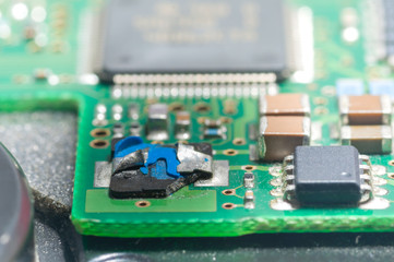 Closeup of electronic circuit board with processor,chip failure