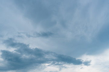 clouds with background,sunlight through very dark clouds background of dark storm clouds,black sky Background of dark clouds before a thunder.