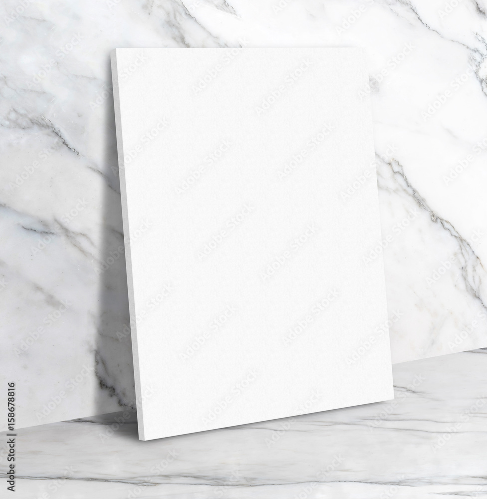 Poster blank white poster canvas in white glossy marble floor leaning at wall,mock up template for display 