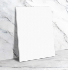 Blank white poster canvas in white glossy marble floor leaning at wall,Mock up template for display...