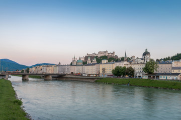 Fototapeta na wymiar Beautiful old town with the river at sunset - Salzburg, Austria
