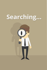 businessman holding a magnifying glass, search concept