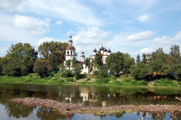 Fototapeta na wymiar Vologda, Russia. View on church of Dimitry Prilutsky on the bank river 