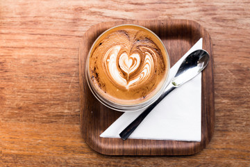 capuchino coffee and wood background
