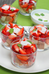 slices of strawberries topped on jelly mouss
