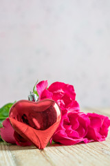  valentine`s day with roses and gift on wooden