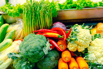 colorful vegetarian healthy food. green mix vegetable sale in Thailand street market.