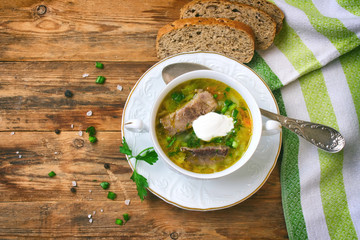 Cabbage soup with beef and sour cream