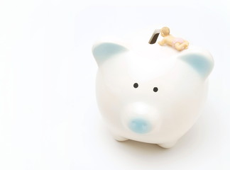 赤ちゃんと貯金箱