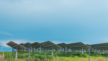 Solar farm and blue sky background. Solar panel. Solar energy system.