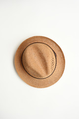 Fototapeta na wymiar Summer straw hat isolated on white background