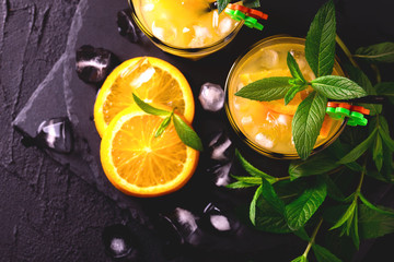 Aperitif with vodka, orange juice and mint. Screwdriver cocktail