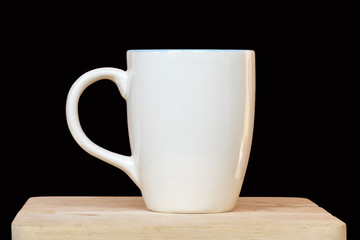 cup of hot coffee on a dark background