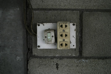 Old plug and Power switch in the room.