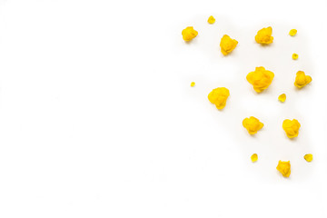 Flowers composition. Card with yellow flowers on white background. Flat lay, top view, copy space, mock up