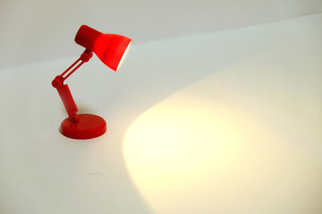 Red lamp lightening warm white light