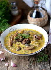 Thick soup of dried mushrooms with onions, carrots and cream.