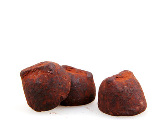 Chocolate truffles isolated on white
