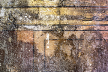 Altes Mauerwerk mit verblassten Farben als Hintergrund