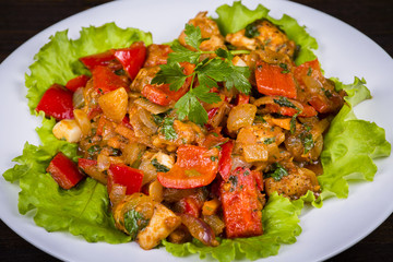 Vegetable stew in plate, close up.