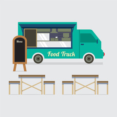 Food Truck With Table Set Vector Illustration
