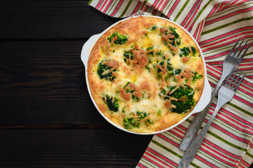 Broccoli baked with egg and cheese. Top view. Copy space