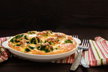 Broccoli baked with egg and cheese. Copy space