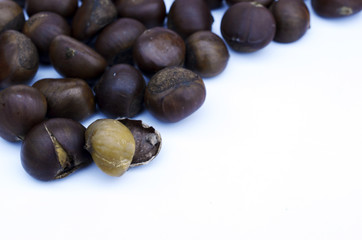 close up of roasted chestnuts on white backgrounds