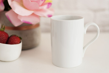 Coffee Cup Product Display. Coffee White Table. Strawberries In Gold Bowl, Vase With Pink Roses