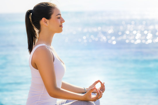 Woman searching for inner self at yoga session.